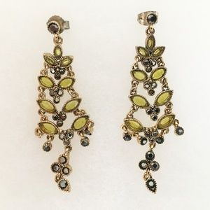 Festive MCNET earrings with green/gray stones.